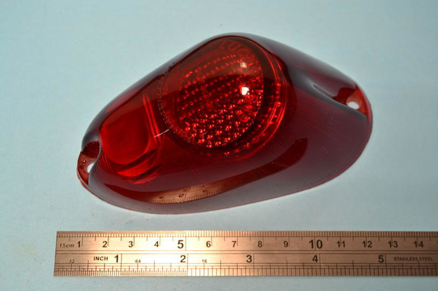 Lens, red, rear lamp. For LH067
