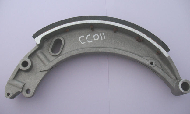 CC011: Main shoe, relined, front footbrake, 0.420" bore for spring, EXCHANGE ONLY
