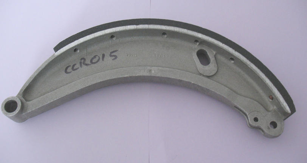 CCR015: Front brake shoe assembly, R-R 20hp, relined; EXCHANGE ONLY.