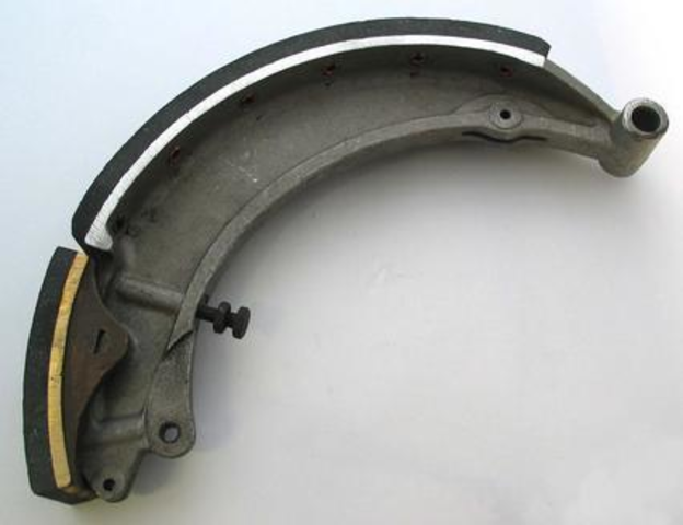 Rear brake shoe assembly, relined; exchange only.